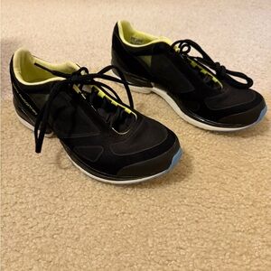 Adidas Stella McCartney size 7.5 black mesh gym shoes.